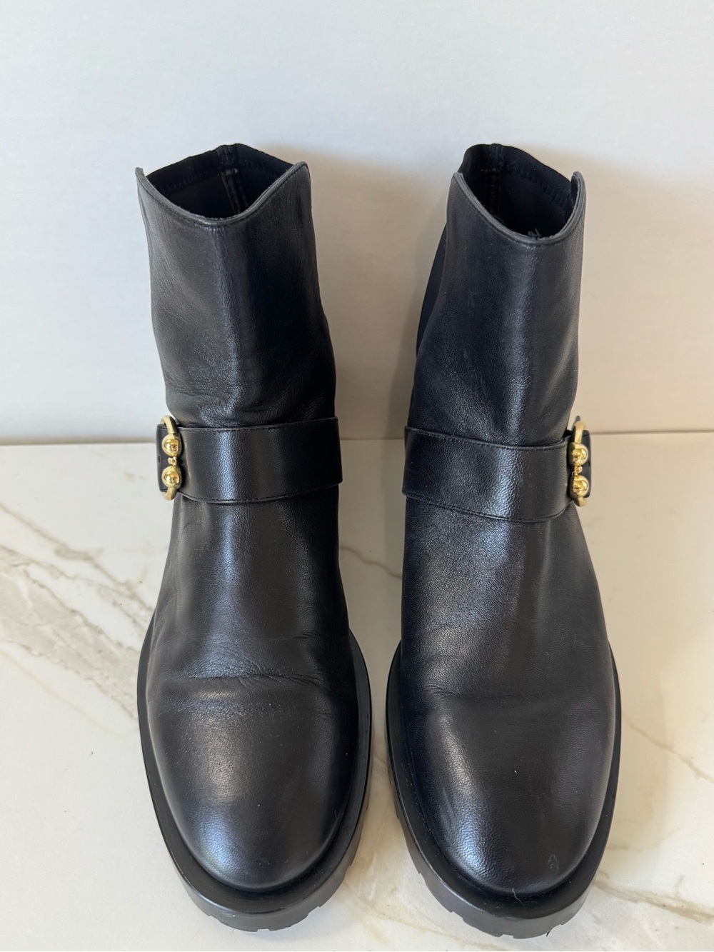 Stuart Weitzman Black Leather Ankle Boots with Gold Buckle